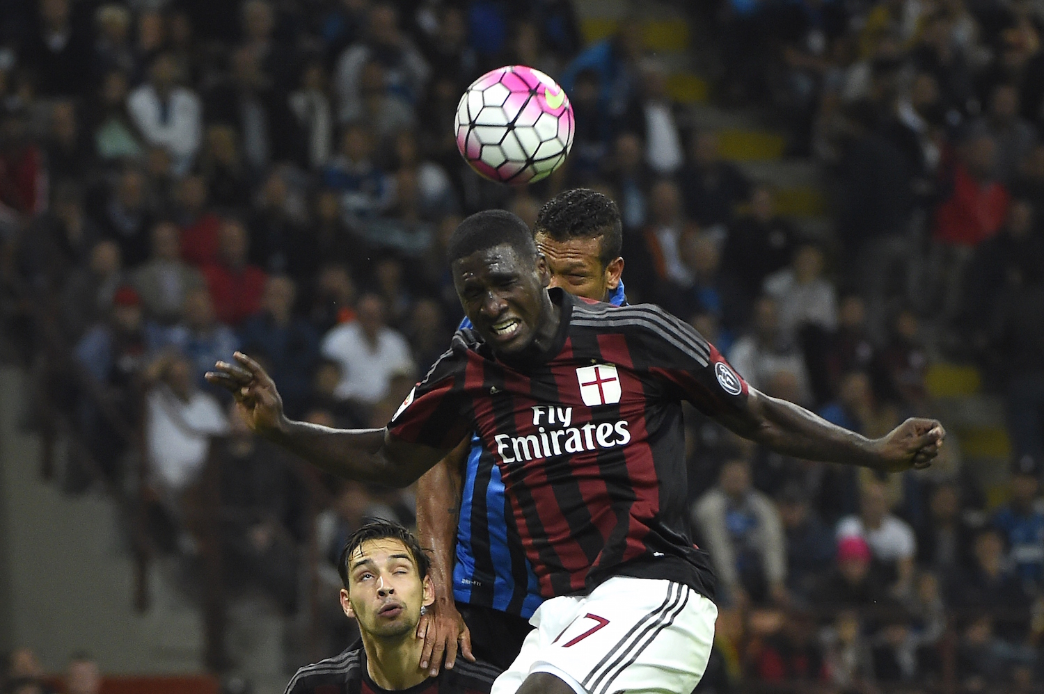 Cristian Zapata competes with Fedy Guarin in the air. | OLIVIER MORIN/AFP/Getty Images