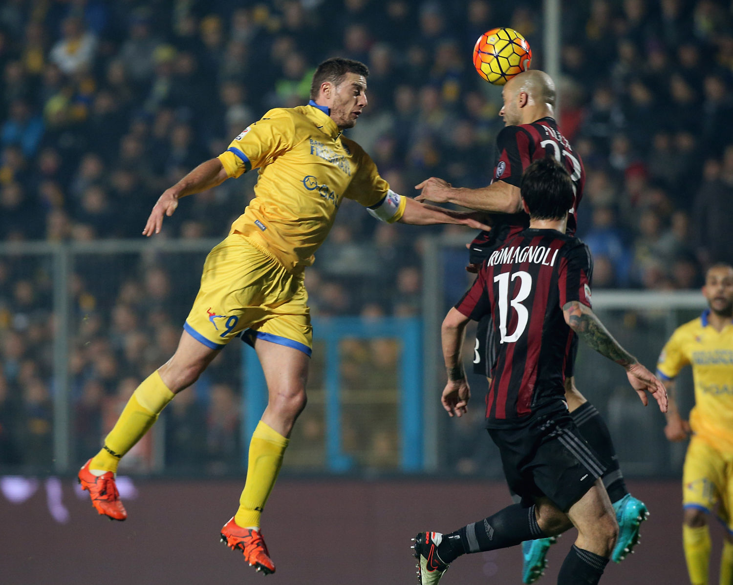 Alex competes for the ball in air with Daniel Ciofani. | Maurizio Lagana/Getty Images