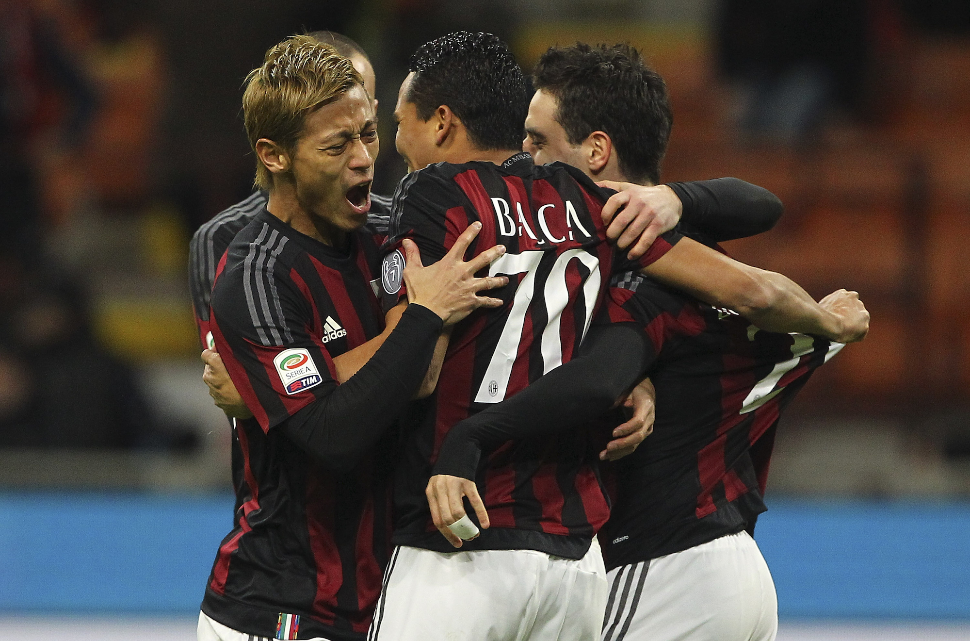 Bacca, Bonaventura and Honda celebrate the opener vs. Fiorentina. | Marco Luzzani/Getty Images