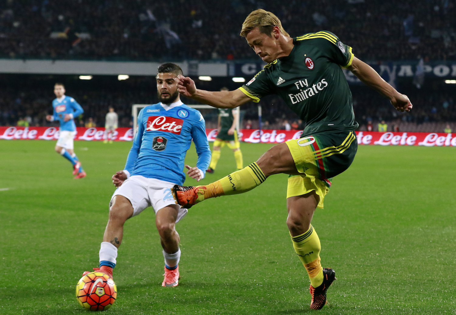 Honda attempts the cross on the wing. | CARLO HERMANN/AFP/Getty Images