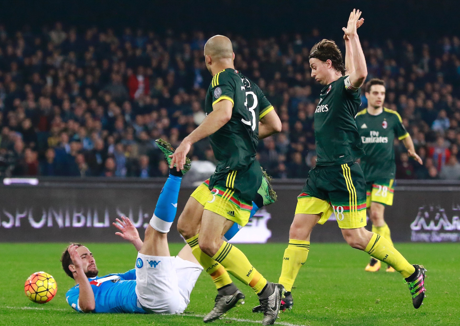 Higuain tumbled under Montolivo's challenge. | CARLO HERMANN/AFP/Getty Images
