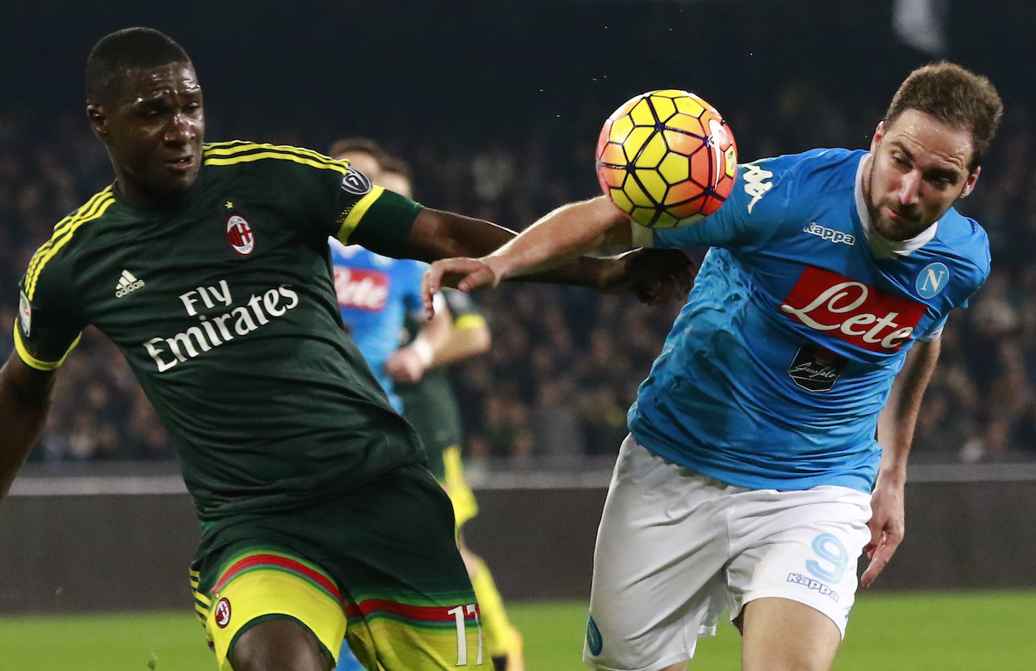 Zapata battles Higuain, as he did so well all night. | CARLO HERMANN/AFP/Getty Images