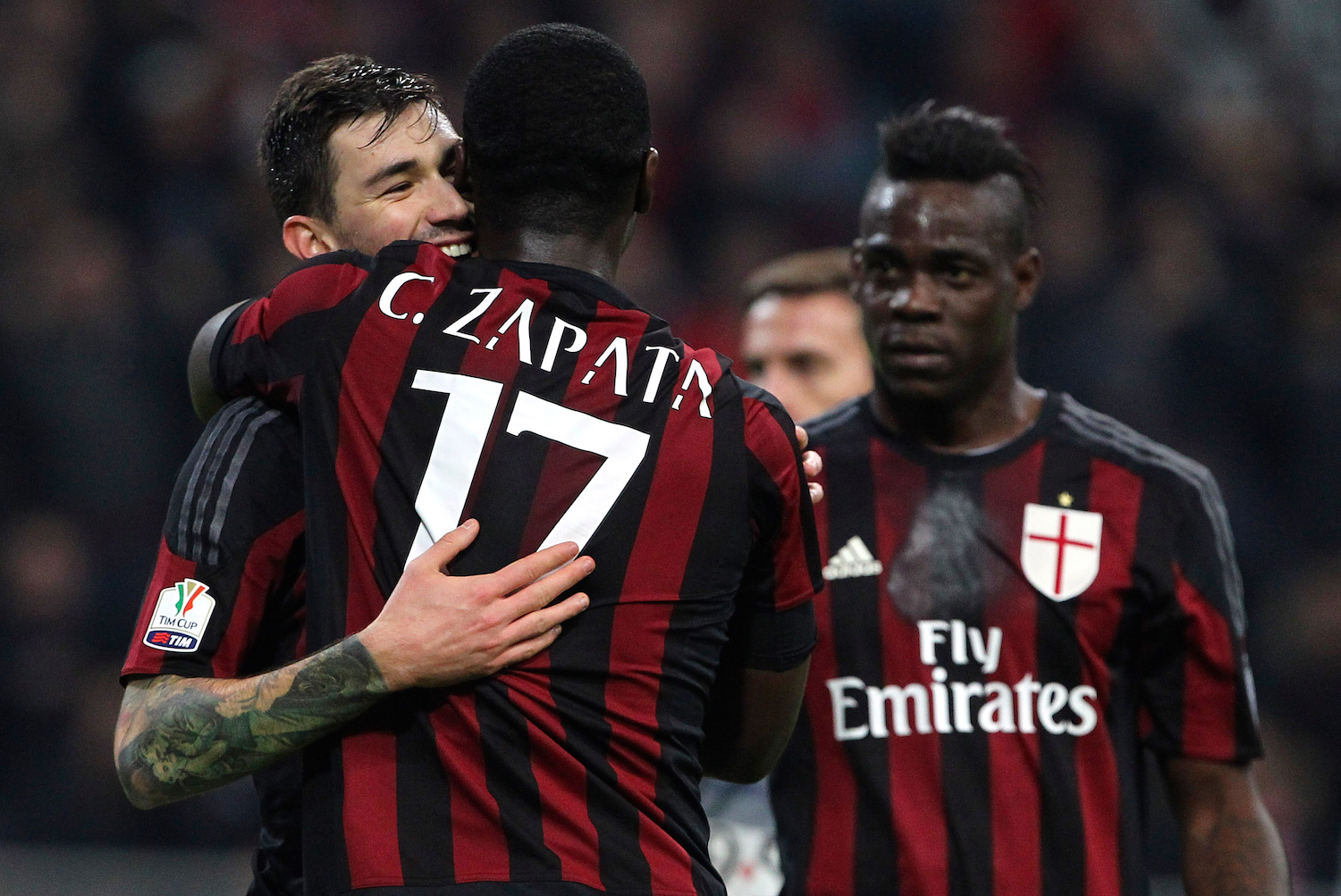 Zapata and Romagnoli embrace after a goal. | Marco Luzzani/Getty Images