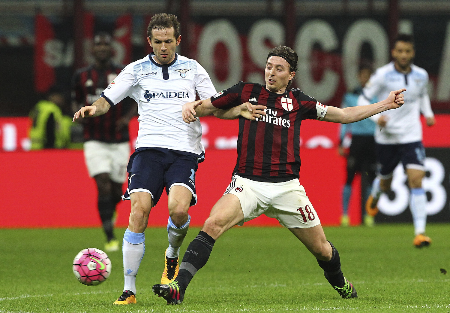 Montolivo and Biglia tussle for possession. | Marco Luzzani/Getty Images