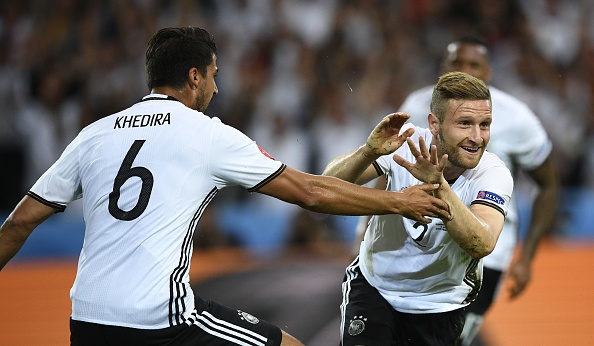Germany's defender Shkodran Mustafi (R) celebrates with Germany's midfielder Sami Khedira after scoring a goal during the Euro 2016 group C football match between Germany and Ukraine at the Stade Pierre Mauroy in Villeneuve-d'Ascq near Lille on June 12, 2016. / AFP / MARTIN BUREAU        (Photo credit should read MARTIN BUREAU/AFP/Getty Images)