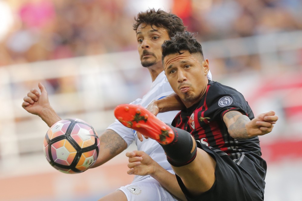 AC Milan's forward Giacomo Lapadula kicks the ball during the Italian Serie A football match AC Milan vs Udinese on September 11, 2016 at 'San Siro Stadium' in Milan. / AFP / MARCO BERTORELLO (Photo credit should read MARCO BERTORELLO/AFP/Getty Images)