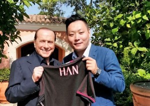 Han Li (representative of Sino-Europe Sports) with Silvio Berlusconi in August this year.