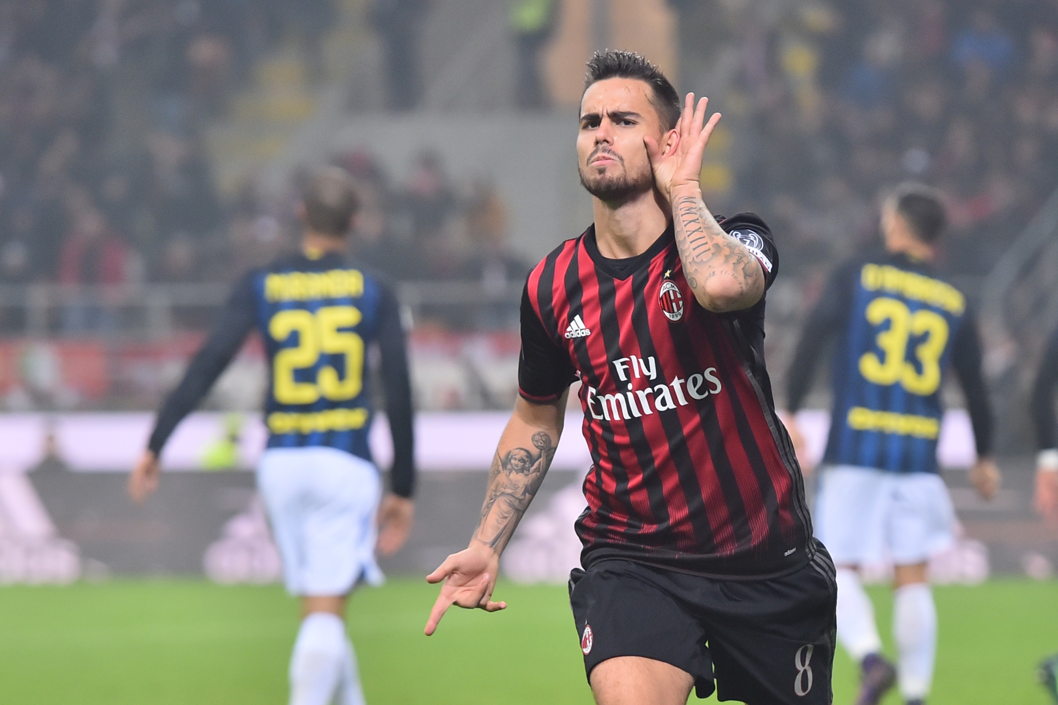 AC Milan's forward from Spain Suso celebrates after scoring during the Italian Serie A football match AC Milan Vs Inter Milan on November 20, 2016 at the 'San Siro Stadium' in Milan. / AFP / GIUSEPPE CACACE (Photo credit should read GIUSEPPE CACACE/AFP/Getty Images)