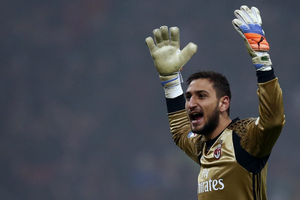 AC Milan's goalkeeper Gianluigi Donnarumma reacts during the Italian Serie A football match AC Milan Vs Inter Milan on November 20, 2016 at the 'San Siro Stadium' in Milan. / AFP / MARCO BERTORELLO (Photo credit should read MARCO BERTORELLO/AFP/Getty Images)