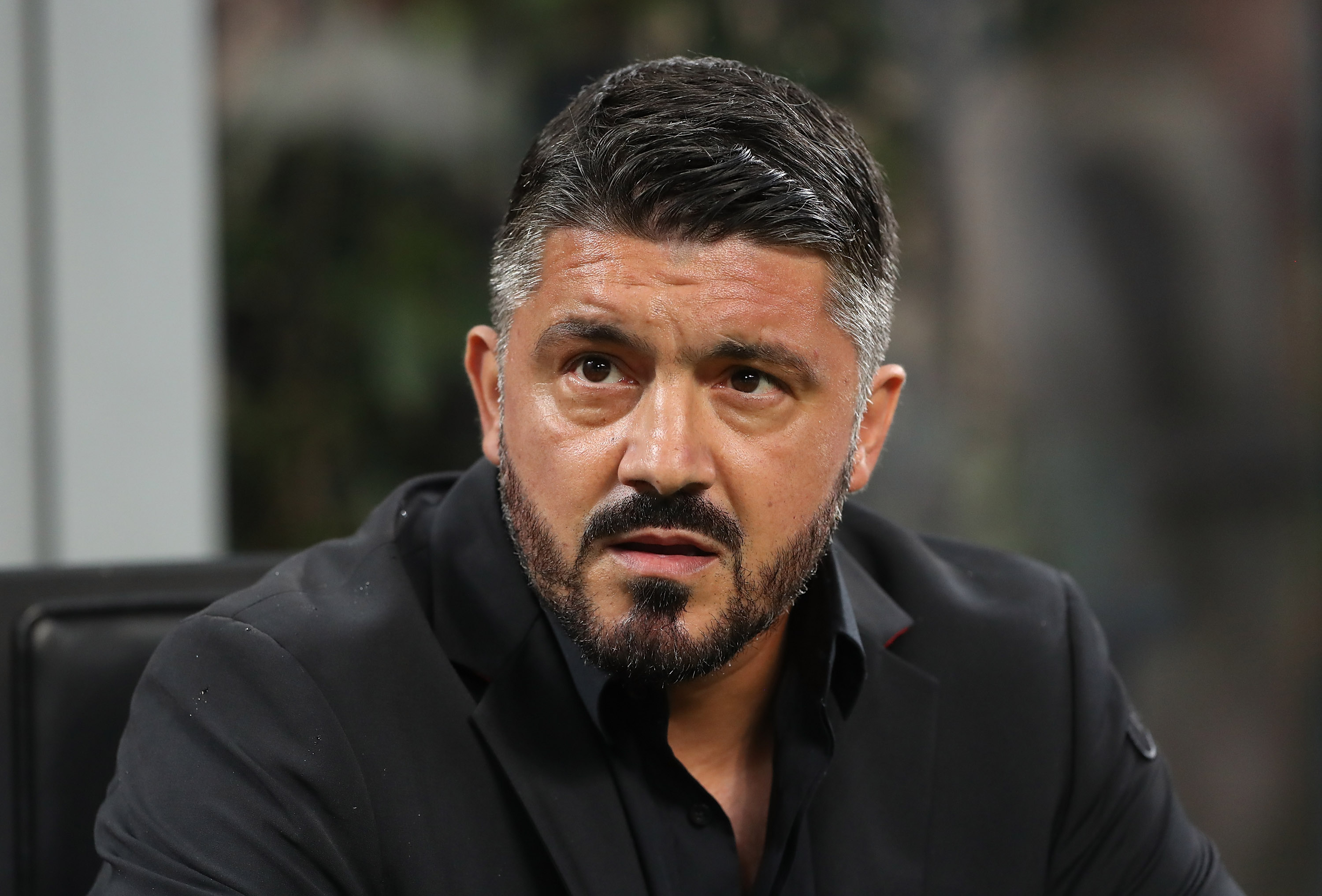 MILAN, ITALY - AUGUST 31: AC Milan coach Gennaro Gattuso looks on before the serie A match between AC Milan and AS Roma at Stadio Giuseppe Meazza on August 31, 2018 in Milan, Italy. (Photo by Marco Luzzani/Getty Images)