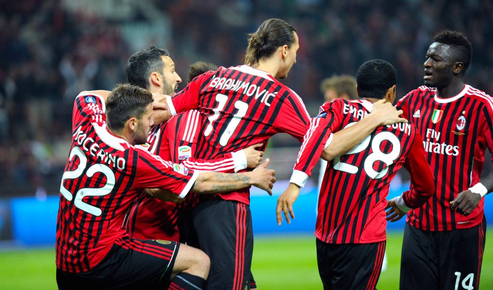 MILAN, ITALY - MARCH 24: Zlatan Ibrahimovic of Milan celebtaes with team-mates after scoring his first goal during the Serie A match between AC Milan and AS Roma at Stadio Giuseppe Meazza on March 24, 2012 in Milan, Italy. (Photo by Dino Panato/Getty Images)