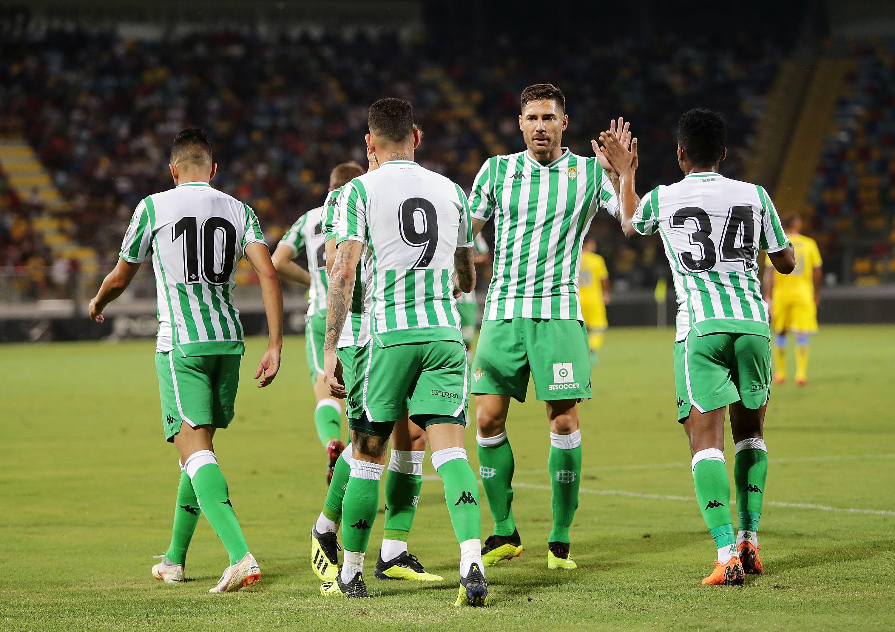 FROSINONE, ITALY - AUGUST 09: Ryad Boudebouz, Antonio Sanabria, Javi Garcia and Wilfrid Kaptoum of Real Betis celebrate the 0-2 goal scored by Antonio Sanabria during the Pre-Season Friendly match between Frosinone Calcio and Real Betis on August 9, 2018 in Frosinone, Italy. (Photo by Francesco Pecoraro/Getty Images)