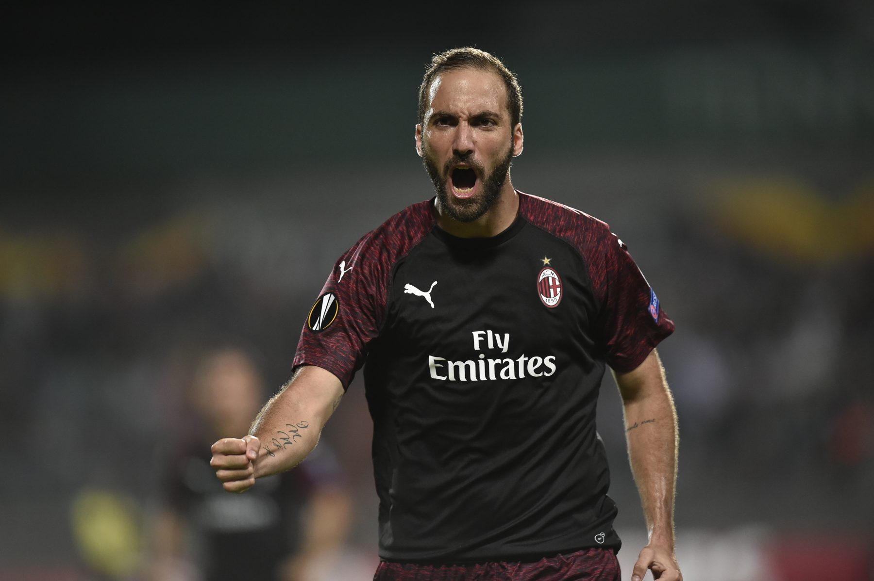 AC Milan's Argentinian forward Gonzalo Higuain celebrates after scoring a goal during the UEFA Europa League Group F football match between F91 Dudelange and AC Milan at the Josy Barthel Stadium in Luxembourg, on September 20, 2018. (Photo by JOHN THYS / AFP) (Photo credit should read JOHN THYS/AFP/Getty Images)