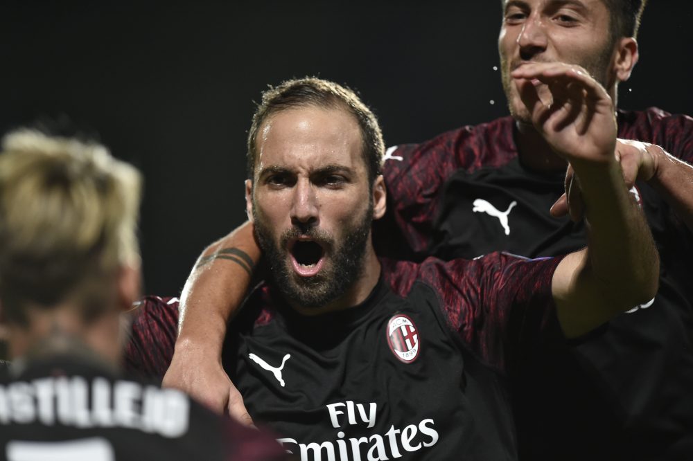 AC Milan's Argentinian forward Gonzalo Higuain celebrates after scoring a goal during the UEFA Europa League Group F football match between F91 Dudelange and AC Milan at the Josy Barthel Stadium in Luxembourg, on September 20, 2018. (Photo by JOHN THYS / AFP) (Photo credit should read JOHN THYS/AFP/Getty Images)
