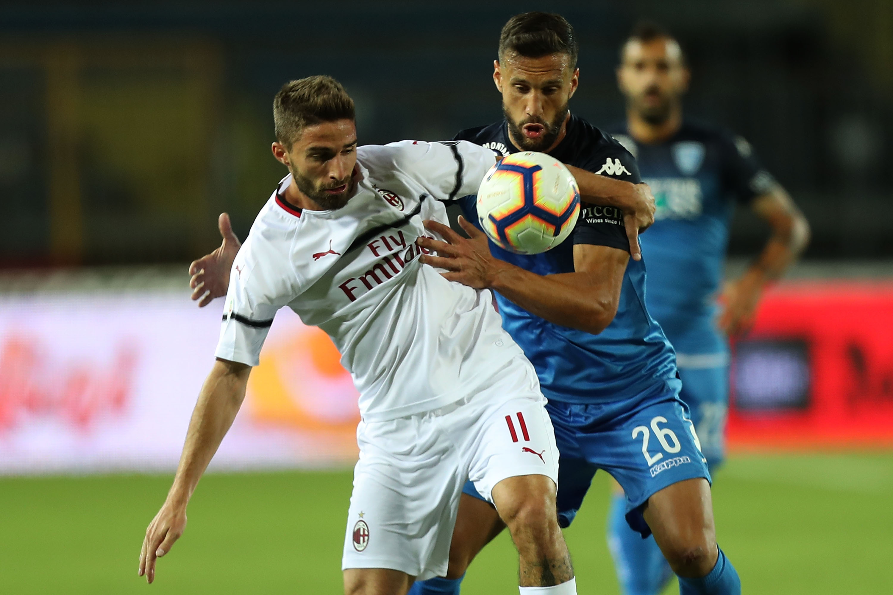 EMPOLI, ITALY - SEPTEMBER 27: Matias Silvestre of Empoli FC fights for the ball with Fabio Borini of AC Milan during the serie A match between Empoli and AC Milan at Stadio Carlo Castellani on September 27, 2018 in Empoli, Italy. (Photo by Gabriele Maltinti/Getty Images)