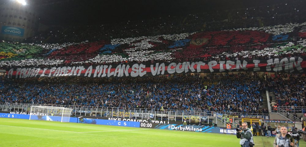 MILAN, ITALY - OCTOBER 21: The AC Milan fans show their support prior to the Serie A match between FC Internazionale and AC Milan at Stadio Giuseppe Meazza on October 21, 2018 in Milan, Italy. (Photo by Emilio Andreoli/Getty Images)