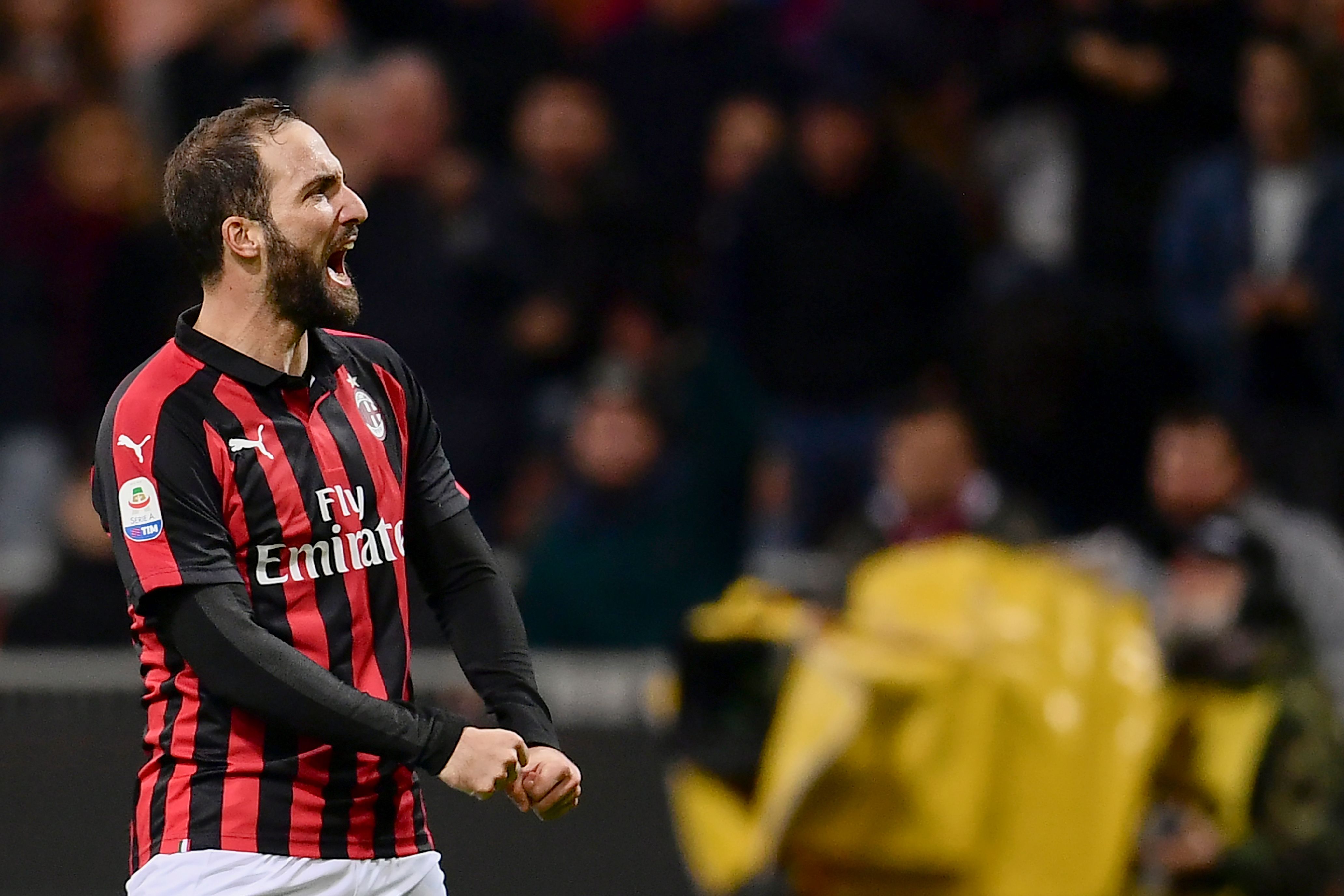 AC Milan's Argentinian forward Gonzalo Higuain celebrates after scoring during the Italian Serie A football match AC Milan vs Sampdoria at the 'Giuseppe Meazza Stadium' in Milan, on October 28, 2018. (Photo by MARCO BERTORELLO / AFP) (Photo credit should read MARCO BERTORELLO/AFP/Getty Images)