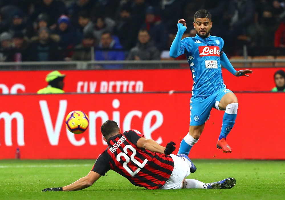 MILAN, ITALY - JANUARY 26: Lorenzo Insigne (R) of SSC Napoli competes for the ball with of Mateo Musacchio (down) AC Milan during the Serie A match between AC Milan and SSC Napoli at Stadio Giuseppe Meazza on January 26, 2019 in Milan, Italy. (Photo by Marco Luzzani/Getty Images)
