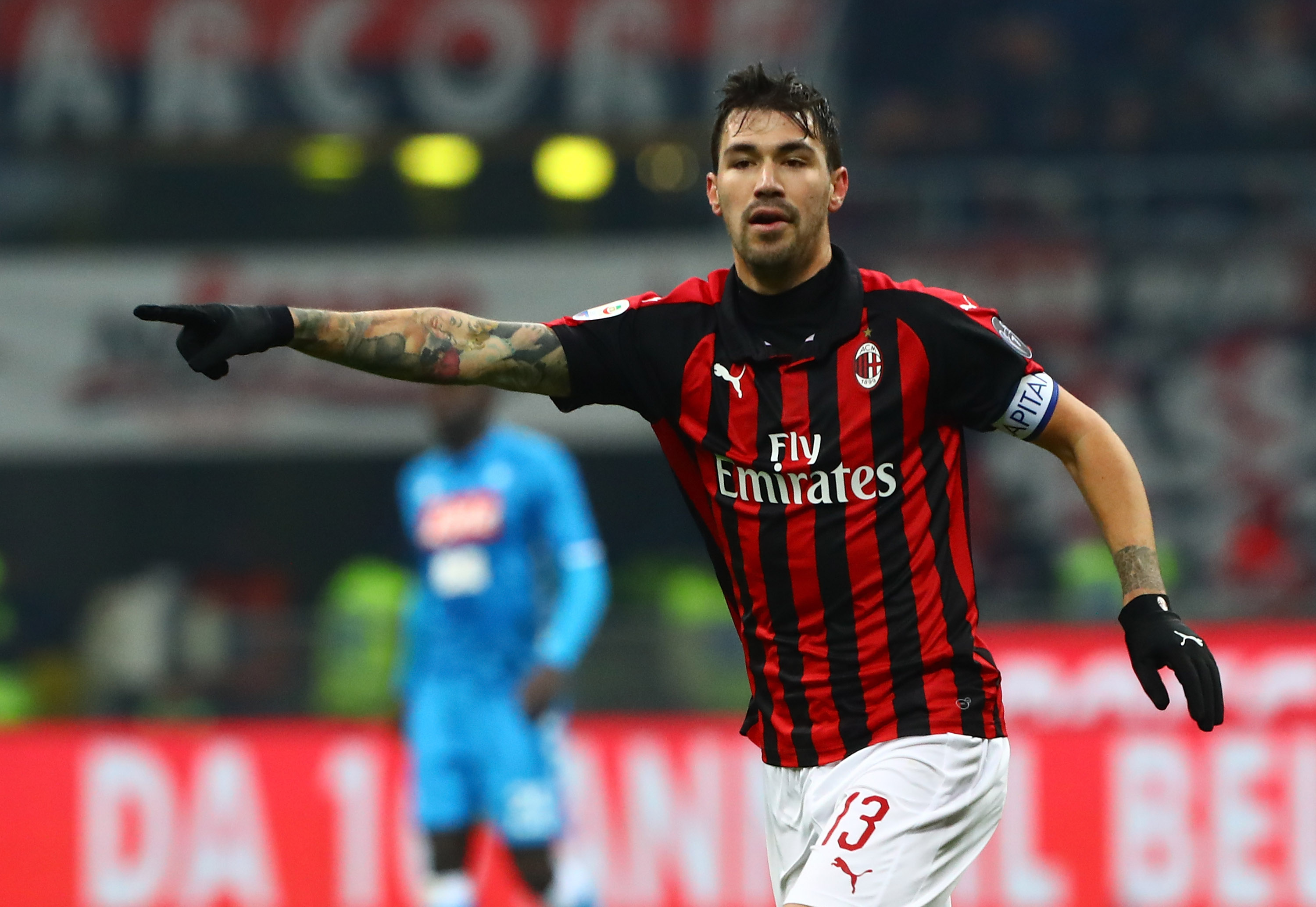 MILAN, ITALY - JANUARY 26: Alessio Romagnoli of AC Milan gestures during the Serie A match between AC Milan and SSC Napoli at Stadio Giuseppe Meazza on January 26, 2019 in Milan, Italy. (Photo by Marco Luzzani/Getty Images)