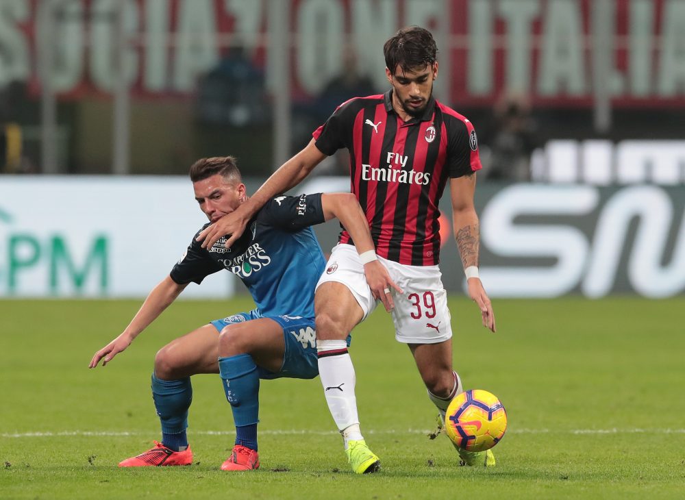 MILAN, ITALY - FEBRUARY 22: Lucas Paqueta of AC Milan is challenged by Ismael Bennacer of Empoli FC during the Serie A match between AC Milan and Empoli at Stadio Giuseppe Meazza on February 22, 2019 in Milan, Italy. (Photo by Emilio Andreoli/Getty Images)