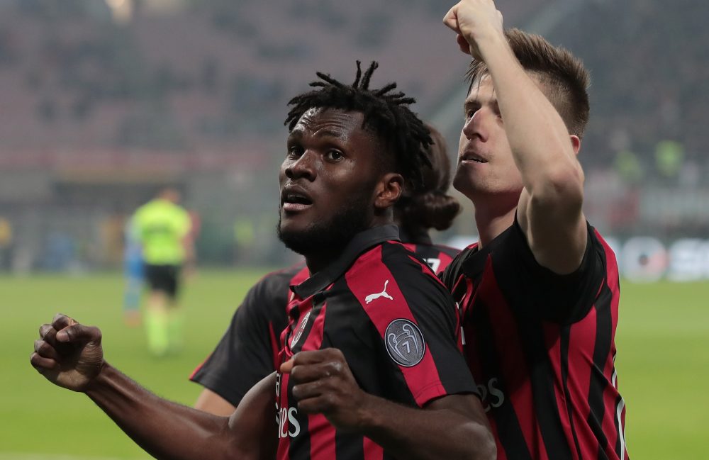 MILAN, ITALY - FEBRUARY 22: Frank Kessie of AC Milan celebrates his goal with his team-mate Krzysztof Piatek during the Serie A match between AC Milan and Empoli at Stadio Giuseppe Meazza on February 22, 2019 in Milan, Italy. (Photo by Emilio Andreoli/Getty Images)