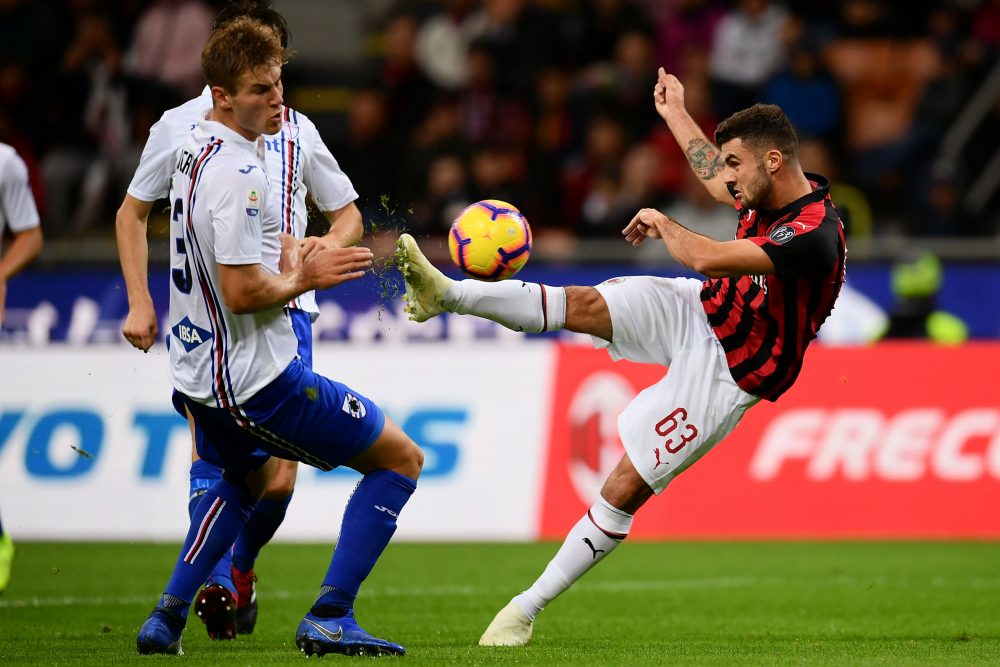 AC Milan's forward Patrick Cutrone from Italy (R) fights for the ball with Sampdoria's defender Joachim Andersen from Denmark during the Italian Serie A football match AC Milan vs Sampdoria on October 28, 2018 at the 'Giuseppe Meazza Stadium' in Milan. (Photo by MARCO BERTORELLO / AFP) (Photo credit should read MARCO BERTORELLO/AFP/Getty Images)