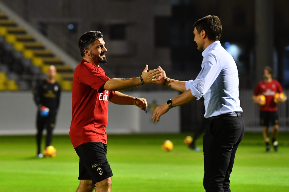 AC Milan's Italian coach Gennaro Gattuso (L) greets his former teammate Paolo Maldini (R) during training at the King Abdullah Sports City Stadium in Jeddah on January 15, 2019, a day before the Supercoppa Italiana final against Juventus. (Photo by GIUSEPPE CACACE / AFP or licensors / AFP) (Photo credit should read GIUSEPPE CACACE/AFP/Getty Images)