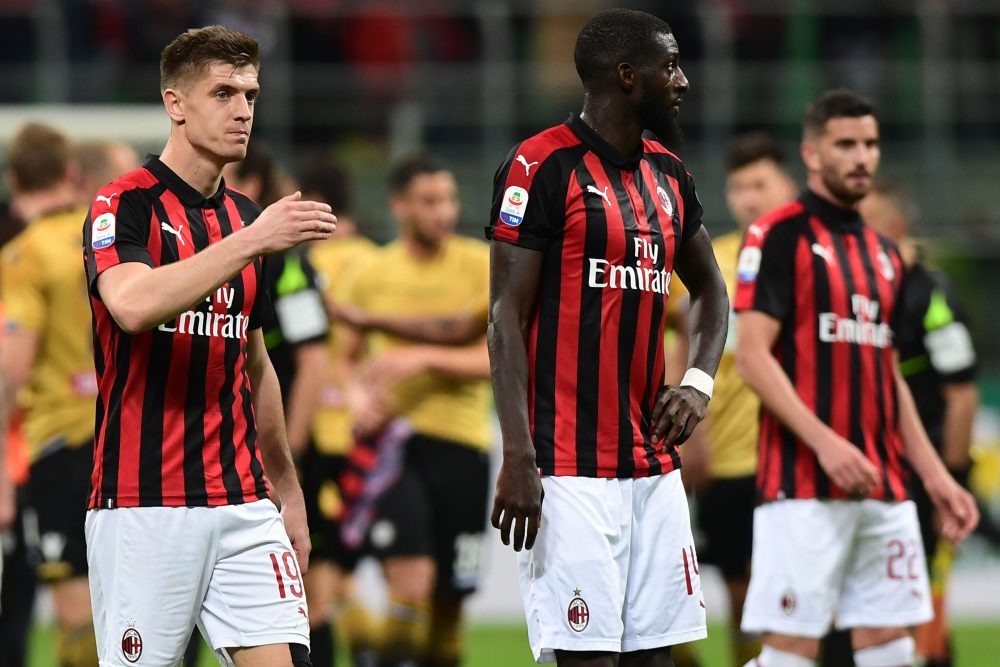 AC Milan's Polish forward Krzysztof Piatek (L) and AC Milan's French midfielder Tiemoue Bakayoko (C) react at the end of the Italian Serie A football march AC Milan vs Udinese on April 2, 2019 at the San Siro stadium in Milan. (Photo by Miguel MEDINA / AFP) (Photo credit should read MIGUEL MEDINA/AFP/Getty Images)