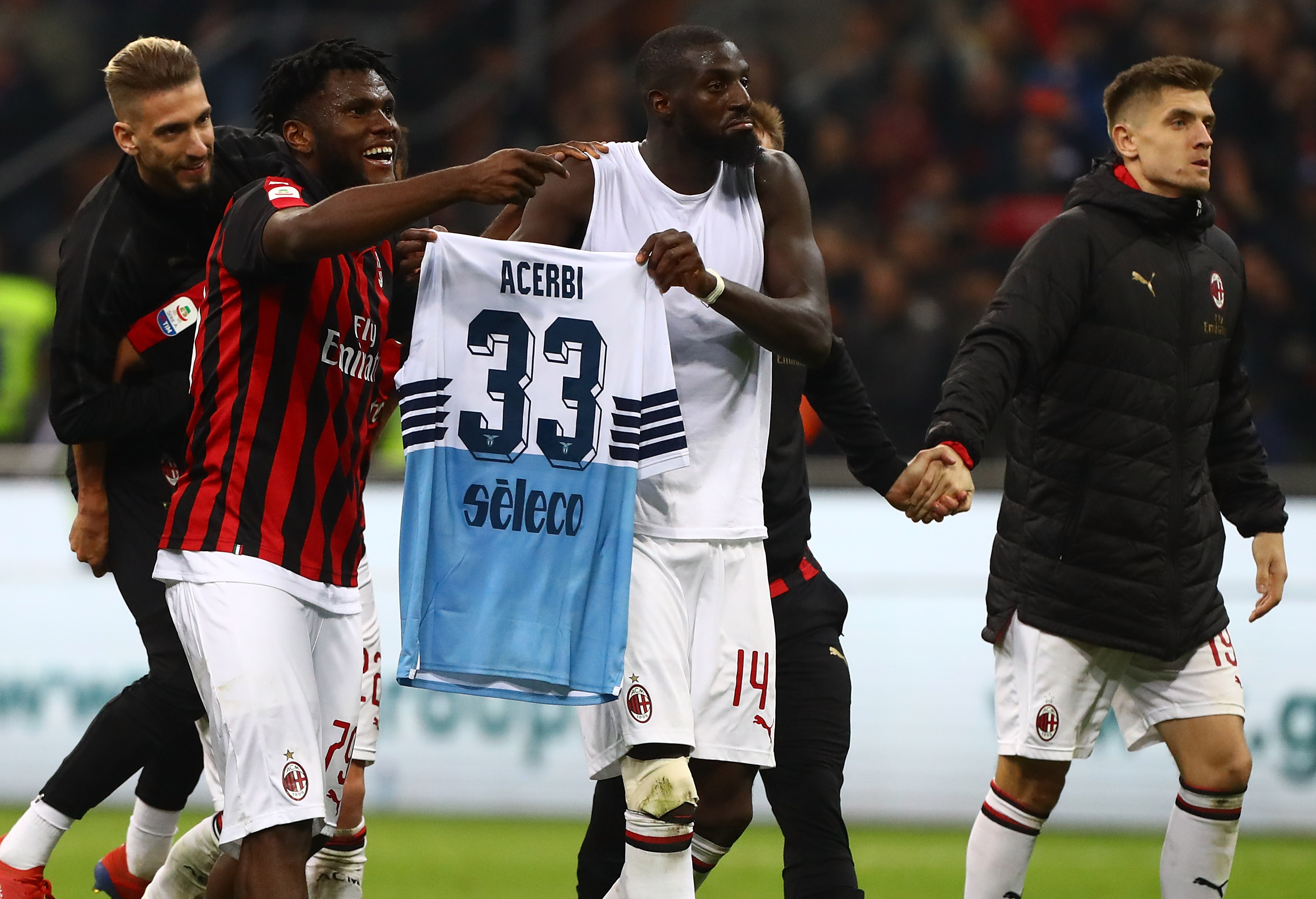 MILAN, ITALY - APRIL 13: (L-R) Samuel Castillejo, Franck Kessie, Tiemoue Bakayoko and Krzysztof Piatek of AC Milan celebrate a victory at the end of the Serie A match between AC Milan and SS Lazio at Stadio Giuseppe Meazza on April 13, 2019 in Milan, Italy. (Photo by Marco Luzzani/Getty Images)