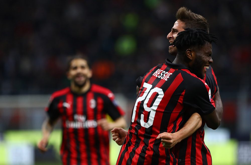 MILAN, ITALY - MAY 06: Fabio Borini of AC Milan celebrates his goal with his team-mate Franck Kessie #79 during the Serie A match between AC Milan and Bologna FC at Stadio Giuseppe Meazza on May 6, 2019 in Milan, Italy. (Photo by Marco Luzzani/Getty Images)
