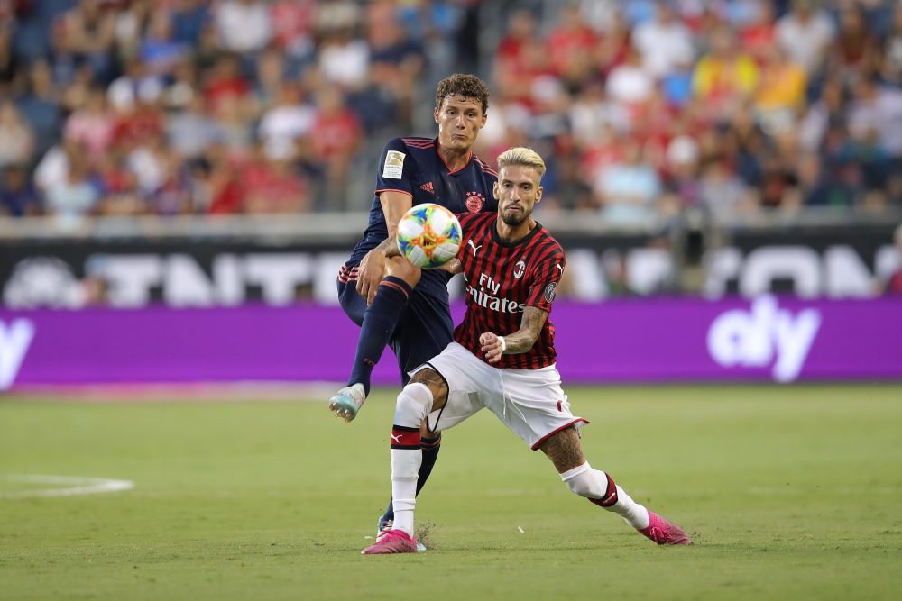 KANSAS CITY, MISSOURI - JULY 23: Benjamin Pavard of FC Bayern Muenchen battles for the ball with Samu Castillejo of AC Milan during the 2019 International Champions Cup match between FC Bayern and AC Milan at Children`s Mercy Park Stadium on July 23, 2019 in Kansas City, Missouri. (Photo by Alexander Hassenstein/Bongarts/Getty Images)
