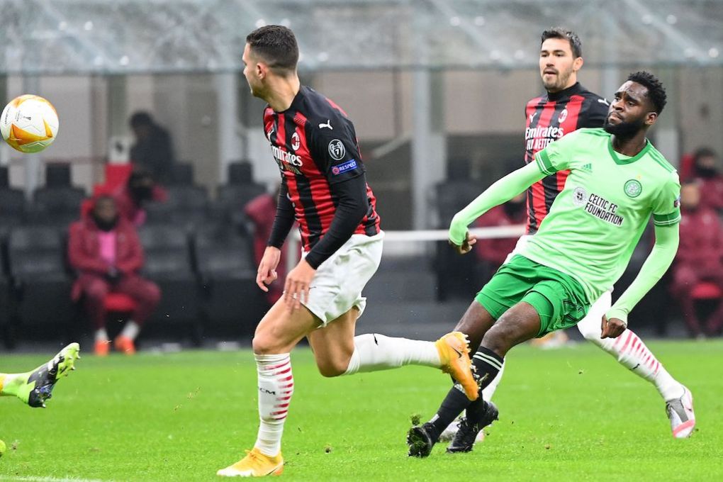Celtic's French forward Odsonne Edouard (R) shoots to score his team's second goal during the UEFA Europa League Group H football match AC Milan vs Celtic on December 3, 2020 at the San Siro stadium in Milan. (Photo by Vincenzo PINTO / AFP) (Photo by VINCENZO PINTO/AFP via Getty Images)