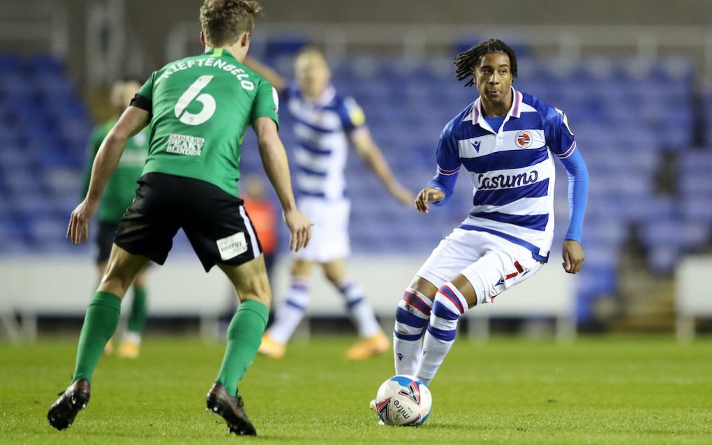 READING, ENGLAND - DECEMBER 09: Michael Olise of Reading FC controls the ball under pressure from Maikel Kieftenbeld of Birmingham City during the Sky Bet Championship match between Reading and Birmingham City at Madejski Stadium on December 09, 2020 in Reading, England. (Photo by Naomi Baker/Getty Images)