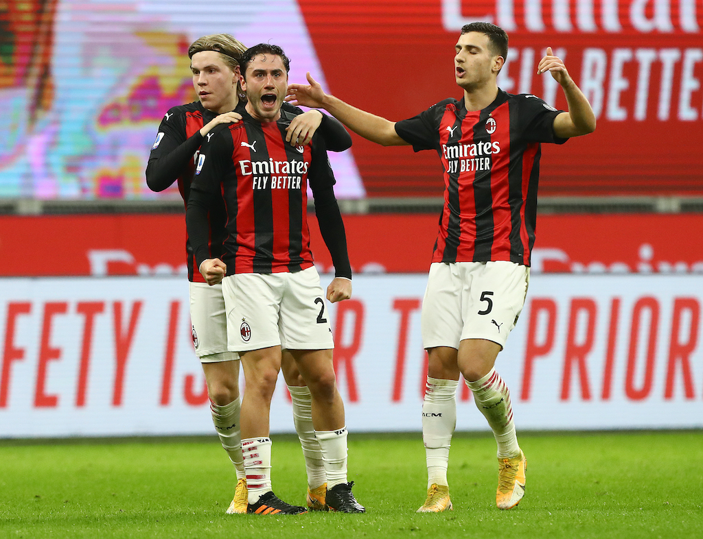MILAN, ITALY - JANUARY 06: Davide Calabria of A.C. Milan celebrates after he scores their team's first goal during the Serie A match between AC Milan and Juventus at Stadio Giuseppe Meazza on January 06, 2021 in Milan, Italy. Sporting stadiums around Italy remain under strict restrictions due to the Coronavirus Pandemic as Government social distancing laws prohibit fans inside venues resulting in games being played behind closed doors. (Photo by Marco Luzzani/Getty Images)