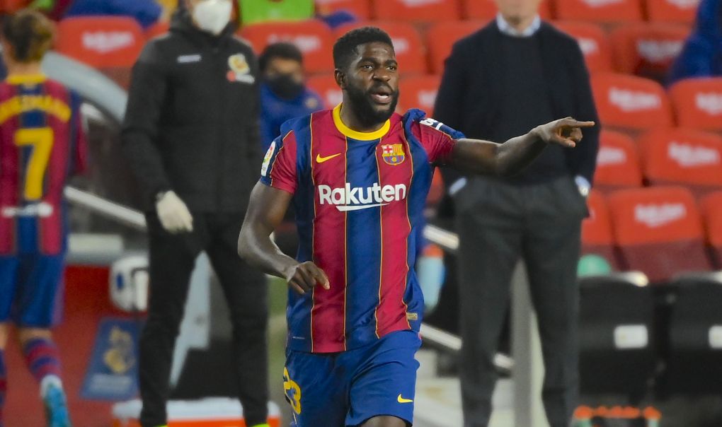 Barcelona's French defender Samuel Umtiti enters the pitch during the Spanish league football match between FC Barcelona and Levante UD at the Camp Nou stadium in Barcelona on December 13, 2020. (Photo by LLUIS GENE / AFP) (Photo by LLUIS GENE/AFP via Getty Images)