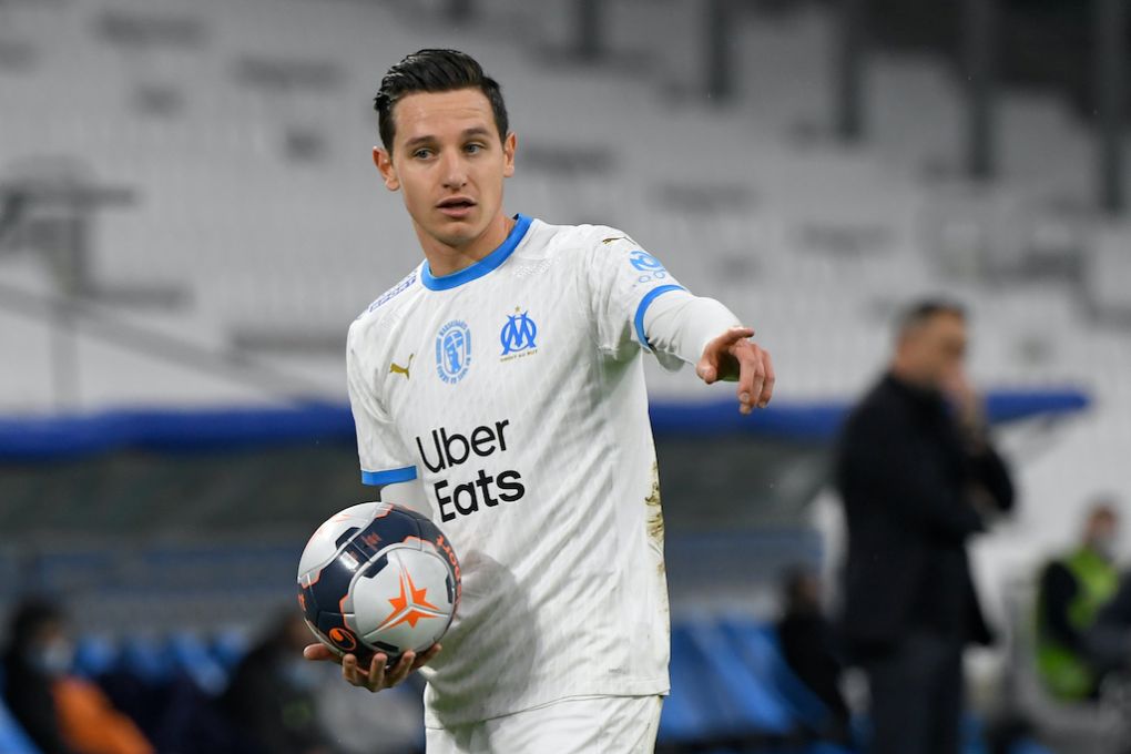 Marseille's French midfielder Florian Thauvin gestures as he holds the ball during the French L1 football match between Olympique de Marseille (OM) and Lens (RCL) at the Velodrome Stadium in Marseille on January 20, 2021. (Photo by NICOLAS TUCAT / AFP) (Photo by NICOLAS TUCAT/AFP via Getty Images)