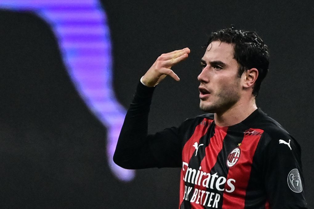 AC Milan's Italian defender Davide Calabria celebrates after scoring an equalizer during the Italian Serie A football match AC Milan vs Juventus on January 6, 2021 at the San Siro stadium in Milan. (Photo by MIGUEL MEDINA / AFP) (Photo by MIGUEL MEDINA/AFP via Getty Images)