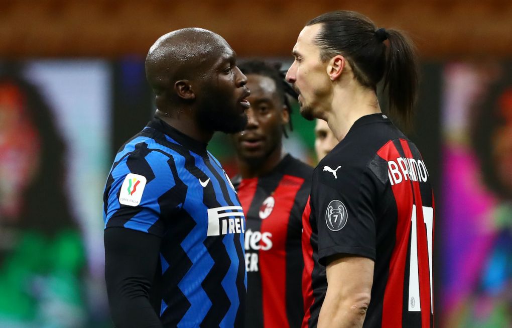 MILAN, ITALY - JANUARY 26: Romelu Lukaku of FC Internazionale clashes with Zlatan Ibrahimovic of AC Milan during the Coppa Italia match between FC Internazionale and AC Milan at Stadio Giuseppe Meazza on January 26, 2021 in Milan, Italy. Sporting stadiums around Italy remain under strict restrictions due to the Coronavirus Pandemic as Government social distancing laws prohibit fans inside venues resulting in games being played behind closed doors. (Photo by Marco Luzzani/Getty Images)