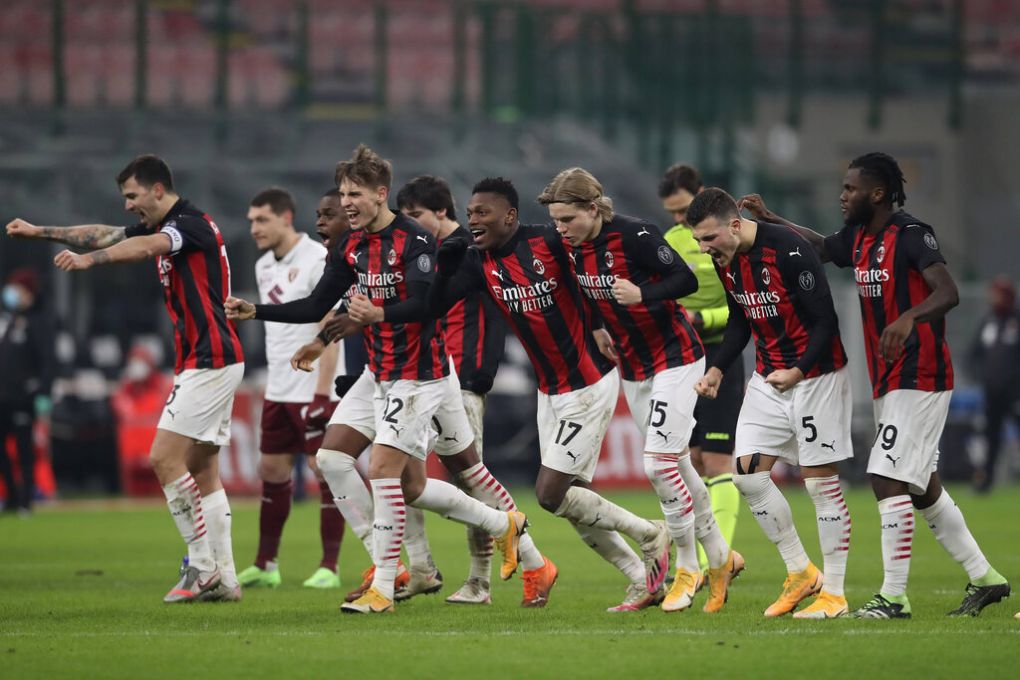 AC Milan players celebrate as they win the penalty shoot out during the Coppa Italia match at Giuseppe Meazza, Milan. Picture date: 12th January 2021. Picture credit should read: Jonathan Moscrop/Sportimage PUBLICATIONxNOTxINxUK SPI-0842-0013
