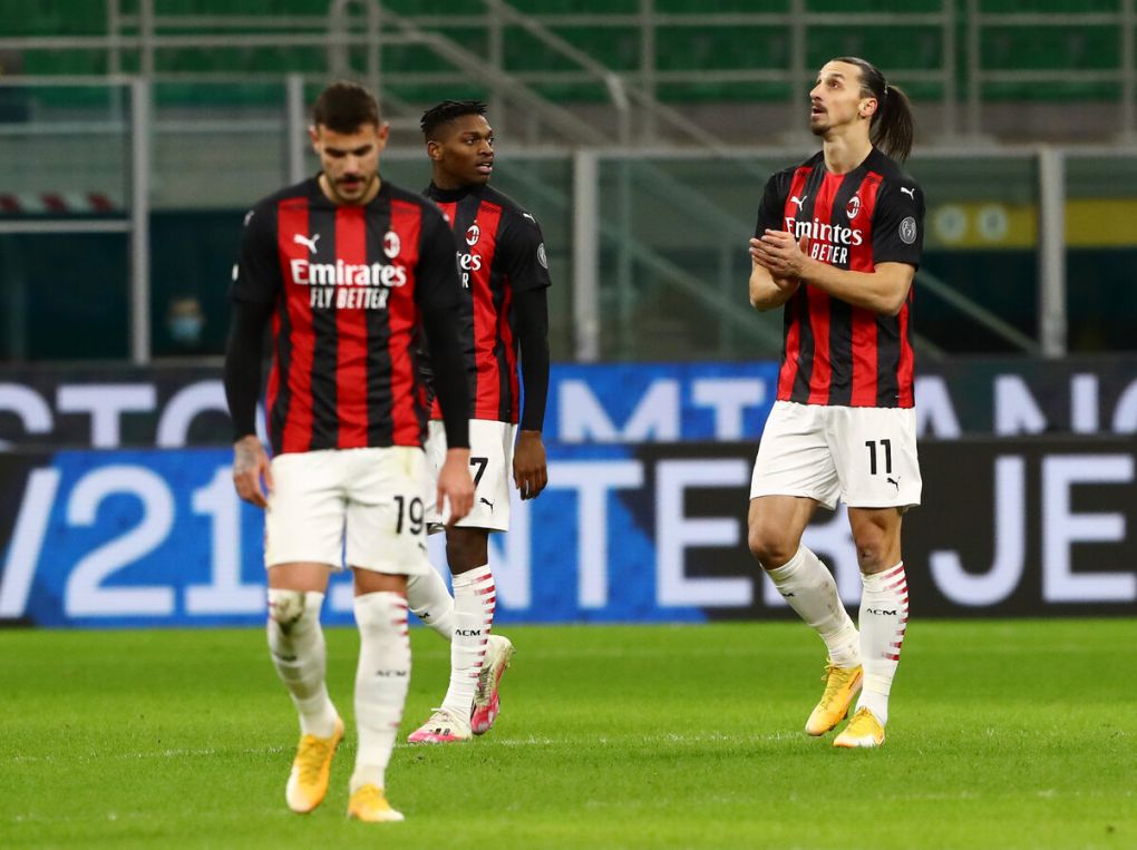 MILAN, ITALY - JANUARY 26: Zlatan Ibrahimovic of AC Milan celebrates after scoring their team's first goal during the Coppa Italia match between FC Internazionale and AC Milan at Stadio Giuseppe Meazza on January 26, 2021 in Milan, Italy. Sporting stadiums around Italy remain under strict restrictions due to the Coronavirus Pandemic as Government social distancing laws prohibit fans inside venues resulting in games being played behind closed doors. (Photo by Marco Luzzani/Getty Images)