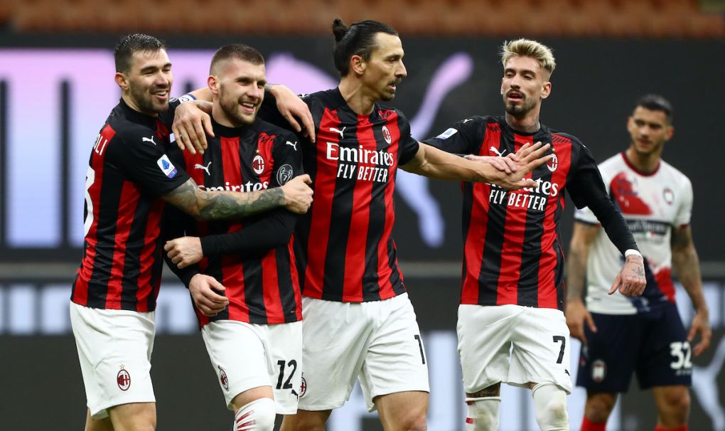 MILAN, ITALY - FEBRUARY 07: Ante Rebic of AC Milan celebrates with team mates (L - R) Alessio Romagnoli, Zlatan Ibrahimovic and Samu Castillejo after scoring their side's third goal during the Serie A match between AC Milan and FC Crotone at Stadio Giuseppe Meazza on February 07, 2021 in Milan, Italy. Sporting stadiums around Italy remain under strict restrictions due to the Coronavirus Pandemic as Government social distancing laws prohibit fans inside venues resulting in games being played behind closed doors. (Photo by Marco Luzzani/Getty Images)