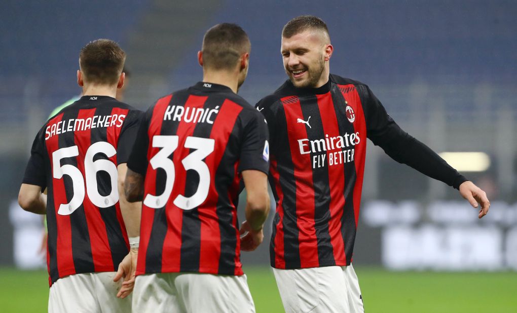 MILAN, ITALY - DECEMBER 23: Ante Rebic of AC Milan celebrates with team mates Rade Krunic and Alexis Saelemaekers after scoring their sides first goal during the Serie A match between AC Milan and SS Lazio at Stadio Giuseppe Meazza on December 23, 2020 in Milan, Italy. Sporting stadiums around Italy remain under strict restrictions due to the Coronavirus Pandemic as Government social distancing laws prohibit fans inside venues resulting in games being played behind closed doors. (Photo by Marco Luzzani/Getty Images)