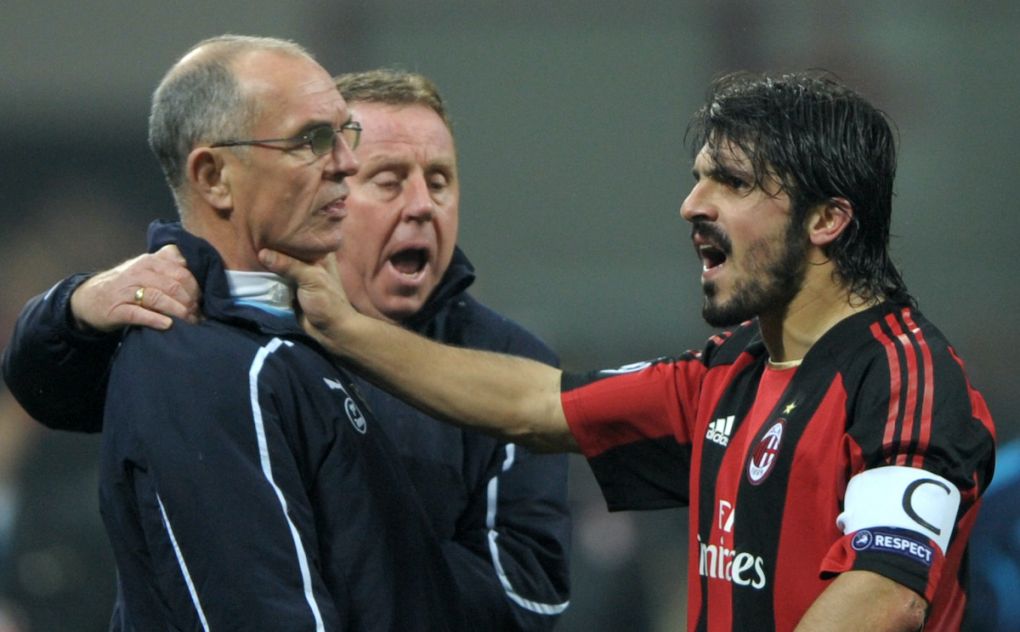 CORRECTING BYLINE + ADDING INFOSAC Milan's midfielder Gennaro Ivan Gattuso (R) grabs Tottenham assistant manager Joe Jordan's neck next to Tottenham manager Harry Redknapp (C) during the Champions League football match AC Milan vs. Tottenham on February 15, 2011 at San Siro Stadium in Milan. AC Milan midfielder Gennaro Gattuso admitted he had lost his head after he butted Tottenham assistant manager Joe Jordan after the final whistle. AFP PHOTO/GIUSEPPE CACACE (Photo credit should read GIUSEPPE CACACE/AFP via Getty Images)