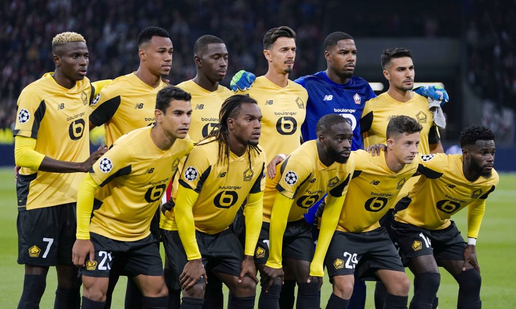 Lille's team players (front row from L to R) Lille's French midfileder Benjamin Andre, Lille's Portuguese midfielder Renato Sanches, Lille's French forward Jonathan Ikone, Lille's Croatian defender Domagoj Bradaric, Lille's French midfielder Jonathan Bamba, (back row from L to R) Lille's Nigerian forward Victor Osimhen, Lille's Brazilian defender Gabriel dos Santos Magalhaes, Lille's French midfielder Boubakary Soumare, Lille's Portuguese defender Jose Fonte, Lille's French goalkeeper Mike Maignan and Lille's Turkish defender Zeki Celik pose for team photo prior to the UEFA Champions league Group H football match between Ajax FC Amsterdam and LOSC Lille, at the Johan Cruijff Arena, in Amsterdam, on September 17, 2019. (Photo by KENZO TRIBOUILLARD / AFP) (Photo by KENZO TRIBOUILLARD/AFP via Getty Images)