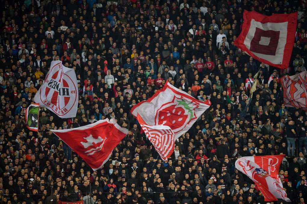 Red Star Belgrade's supporters cheer for their team during the UEFA Champions League Group B football match between Red Star Belgrade (Crvena Zvezda) and Tottenham Hotspur at the Rajko Mitic stadium in Belgrade, on November 6, 2019. (Photo by ANDREJ ISAKOVIC / AFP) (Photo by ANDREJ ISAKOVIC/AFP via Getty Images)