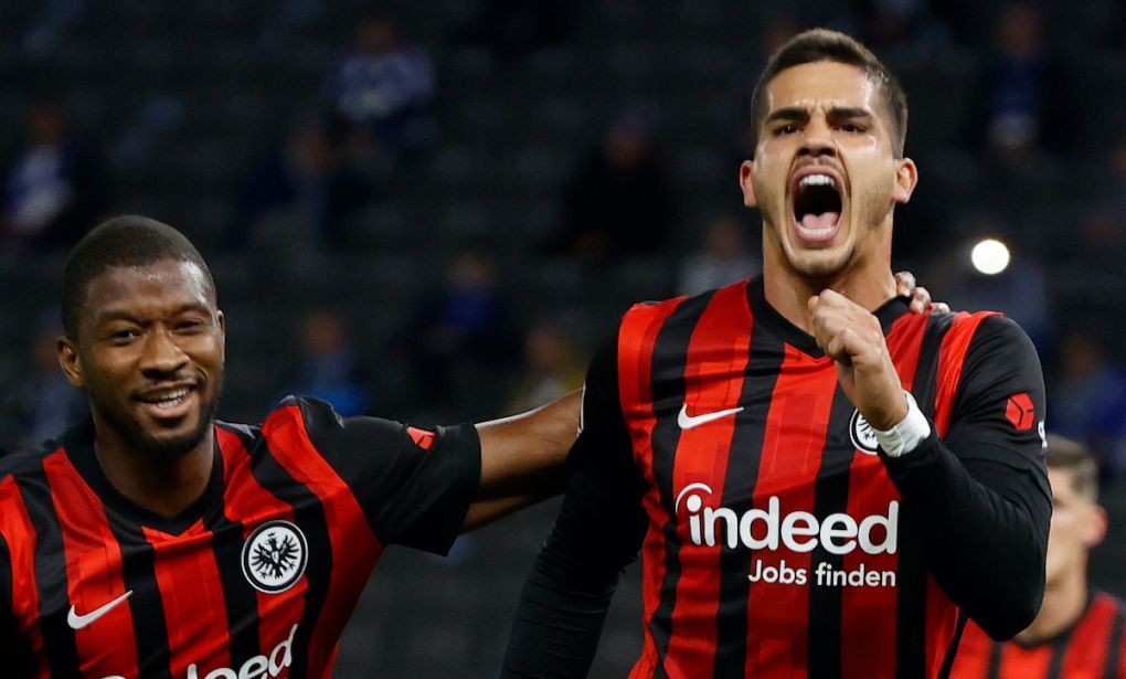 Frankfurt's Portuguese forward Andre Silva (R) celebrates scoring the opening goal from the penalty spot with his teammate Frankfurt's Malian defender Almamy Toure during the German first division Bundesliga football match Hertha Berlin v Eintracht Frankfurt on September 25, 2020 in Berlin. (Photo by Odd ANDERSEN / AFP) / DFL REGULATIONS PROHIBIT ANY USE OF PHOTOGRAPHS AS IMAGE SEQUENCES AND/OR QUASI-VIDEO (Photo by ODD ANDERSEN/AFP via Getty Images)