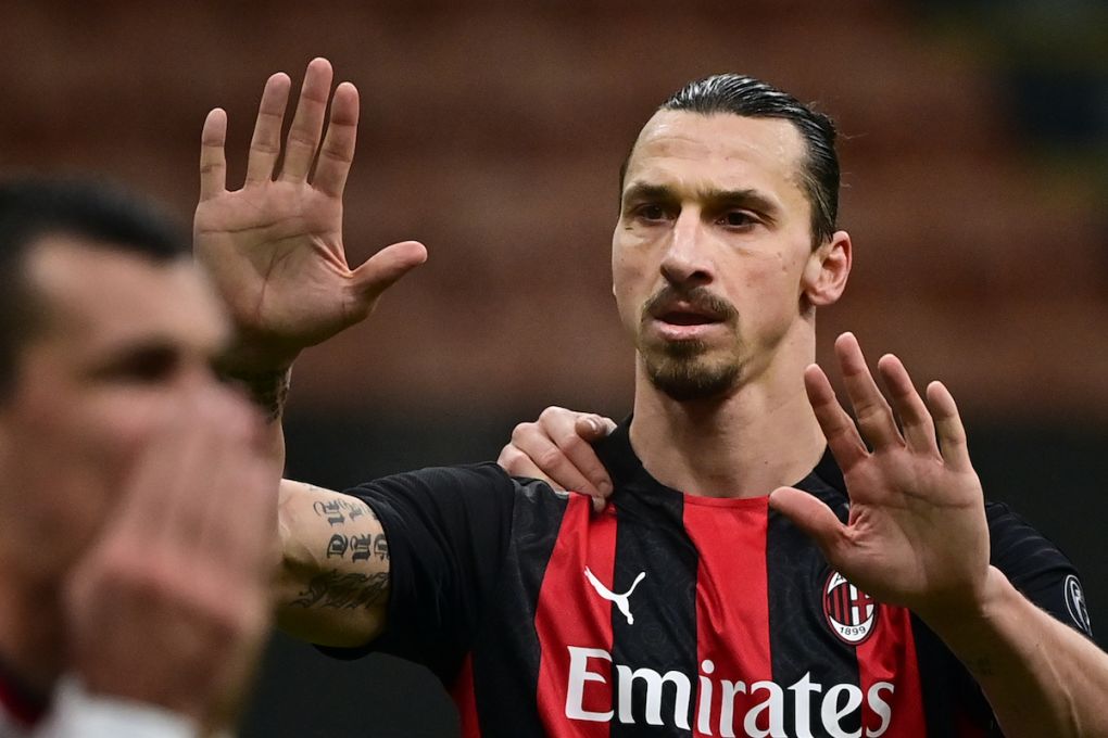AC Milan's Swedish forward Zlatan Ibrahimovic celebrates after scoring his second goal during the Italian serie A football match AC Milan vs Crotone on February 7, 2021 at the San Siro stadium in Milan. (Photo by MIGUEL MEDINA / AFP) (Photo by MIGUEL MEDINA/AFP via Getty Images)