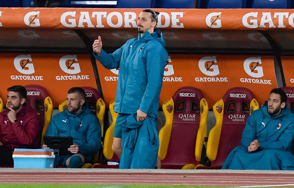 AC Milan's Swedish forward Zlatan Ibrahimovic reacts from the substitutes' bench during the Italian Serie A football match AS Roma vs AC Milan on February 28, 2021 at the Olympic stadium in Rome. (Photo by Tiziana FABI / AFP) (Photo by TIZIANA FABI/AFP via Getty Images)
