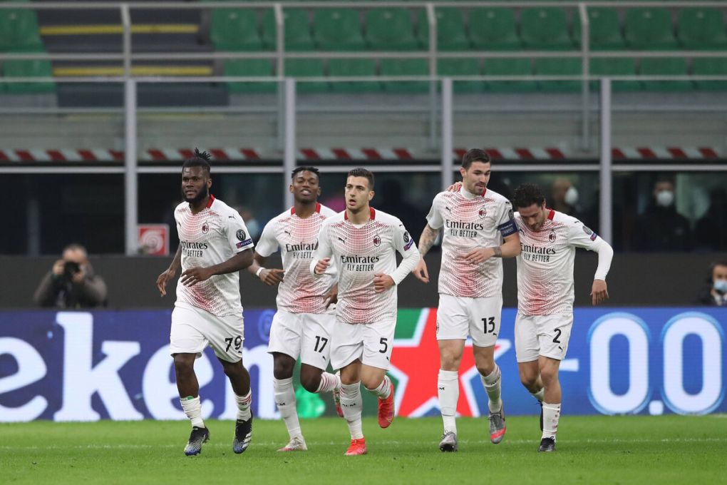 Franck Kessie of AC Milan celebrates with team mates after scoring to give the side a 1-0 lead during the UEFA Champions League match at Giuseppe Meazza, Milan. Picture date: 25th February 2021. Picture credit should read: Jonathan Moscrop/Sportimage PUBLICATIONxNOTxINxUK SPI-0923-0001