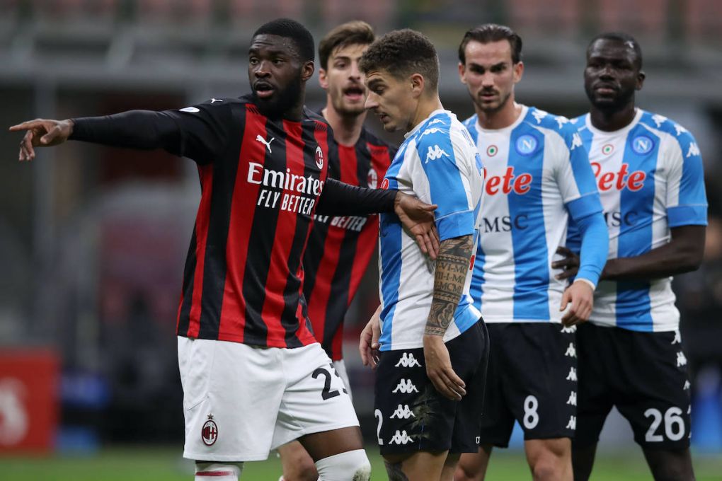 Matteo Gabbia of AC Milan reacts as team mate Fikayo Tomori organises the defence as SSC Napoli players Giovanni Di Lorenzo, Fabian Ruiz and Kalidou Koulibaly of SSC Napoli line up for a corner during the Serie A match at Giuseppe Meazza, Milan. Picture date: 14th March 2021. Picture credit should read: Jonathan Moscrop/Sportimage PUBLICATIONxNOTxINxUK SPI-0955-0032